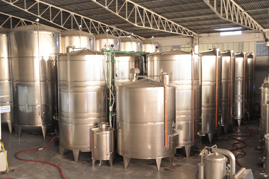wine fermantation tanks at Oinodos Wines facilities